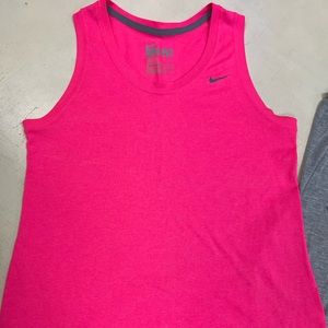 Nike exercise shirt, medium. Like new Dri-Fit material. Pink.